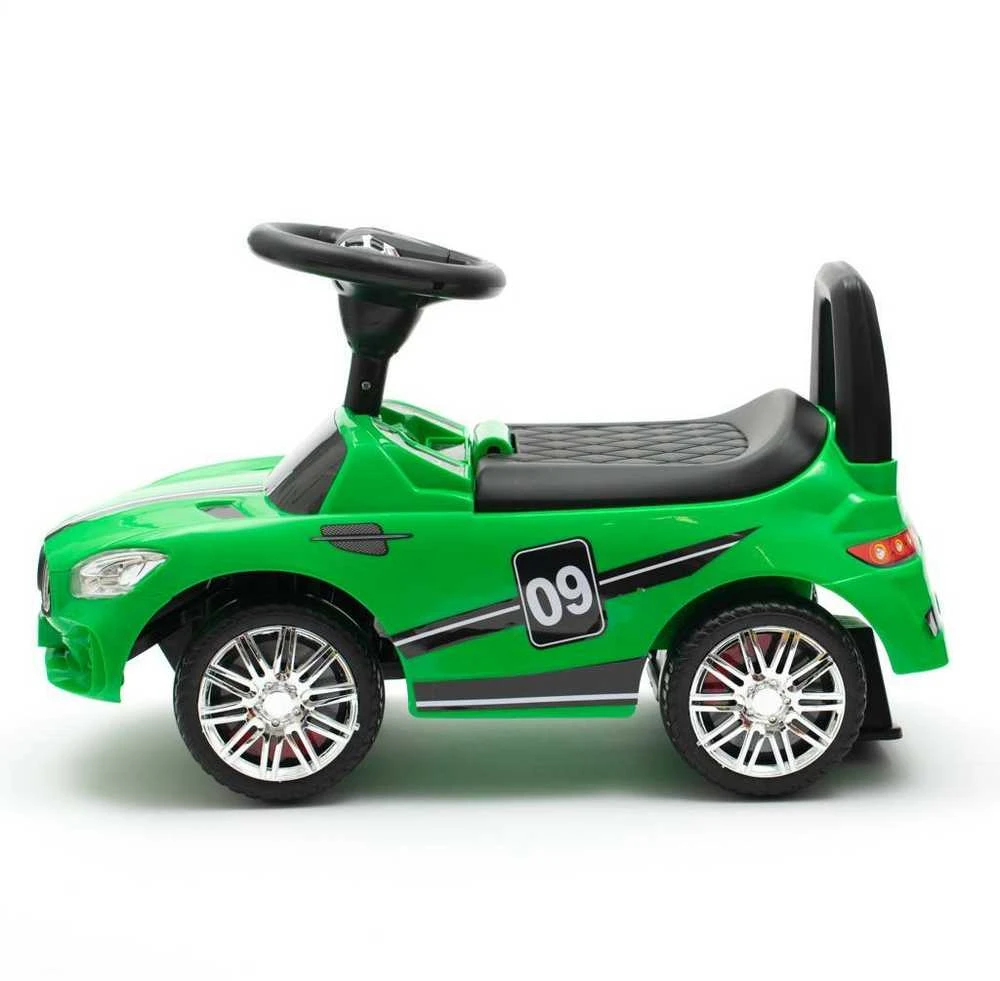 Baby Mix RACER žalias kūdikio supamas žaislas su garsais