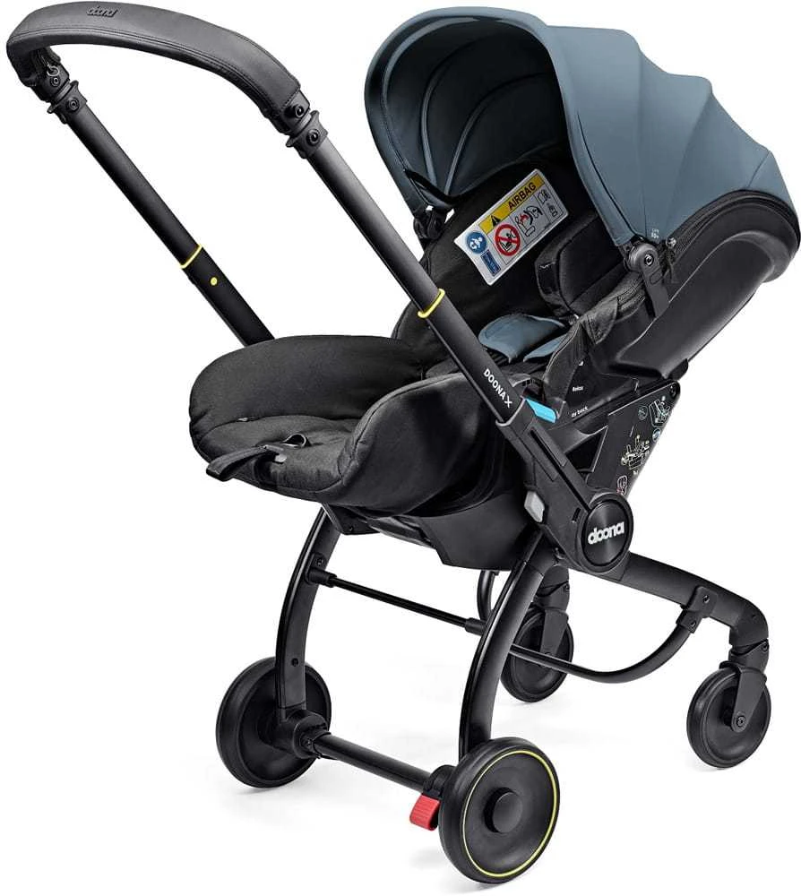 Doona X 0-13 kg Ocean Mėlyna su išskleistu stogeliu