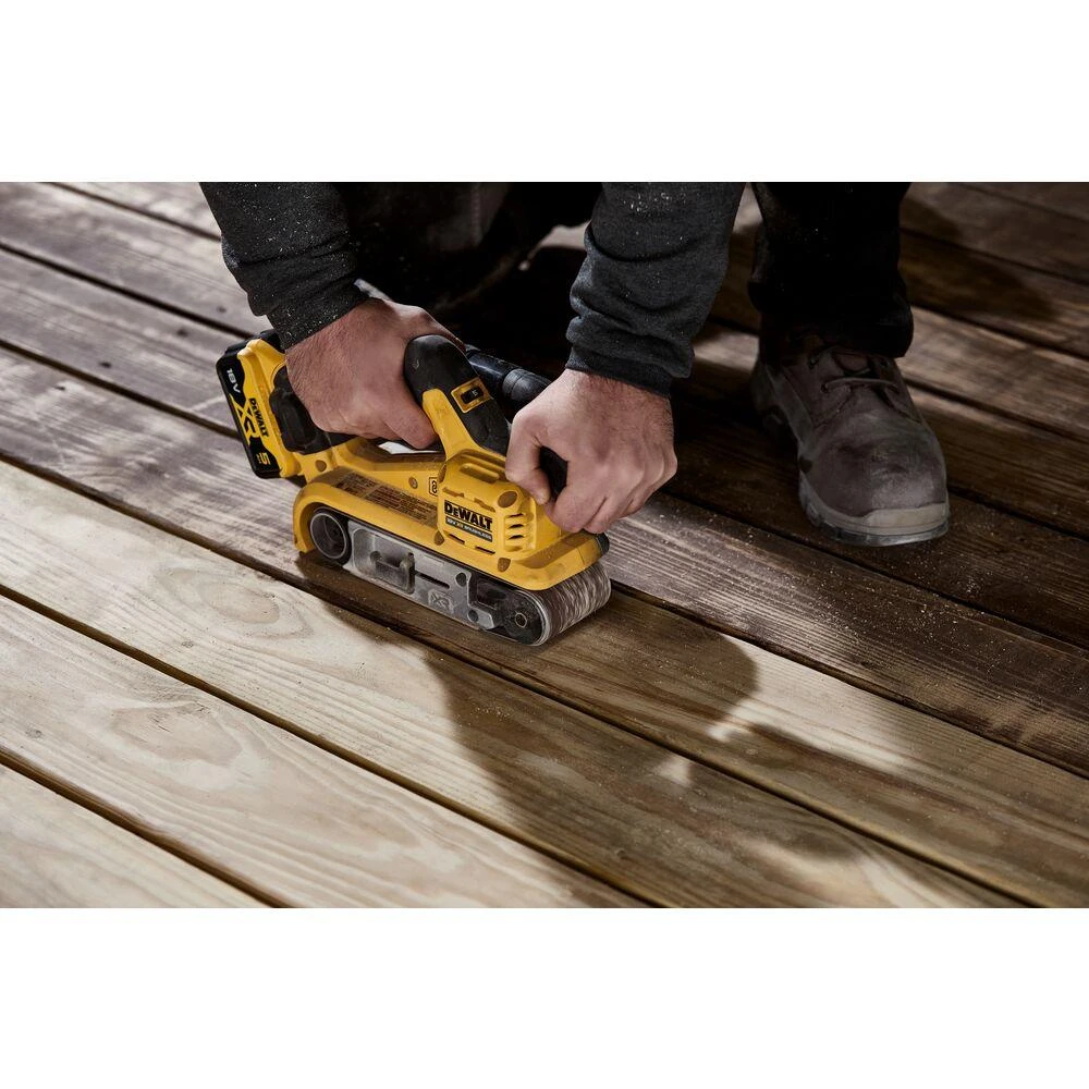 De Walt Juostinis šlifuoklis DeWalt DCW220N-XJ; 18 V (be akumuliatoriaus ir pakrovėjo)