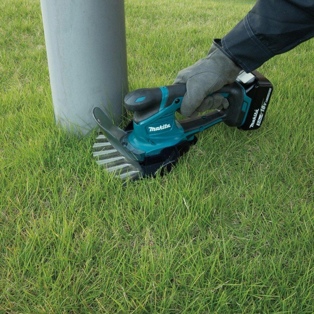 Žolės ir krūmų žirklės Makita DUM604SYX 18 V, 1x1,5 Ah