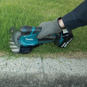 Žolės ir krūmų žirklės Makita DUM604SYX 18 V, 1x1,5 Ah