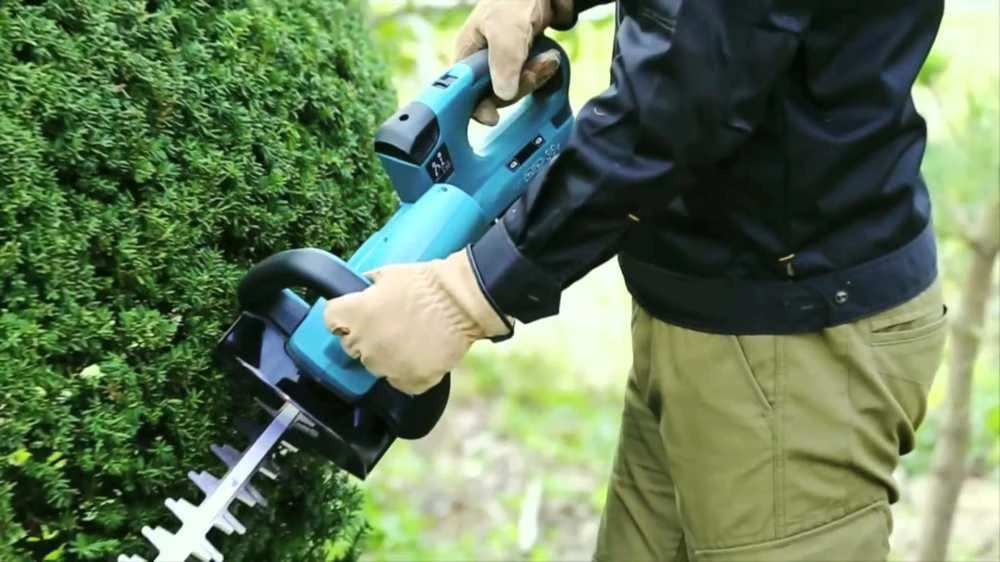 Akumuliatorinės gyvatvorių žirklės, 18 V, 2 x 5,0 Ah, 55 cm, Makita [DUH551PT2] + nemokamos pirštinės ir alyva