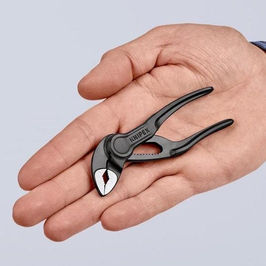 Cobra XS 100 mm replės KNIPEX kalėdinėje pakuotėje [87 00 100 XMAS] dovanai