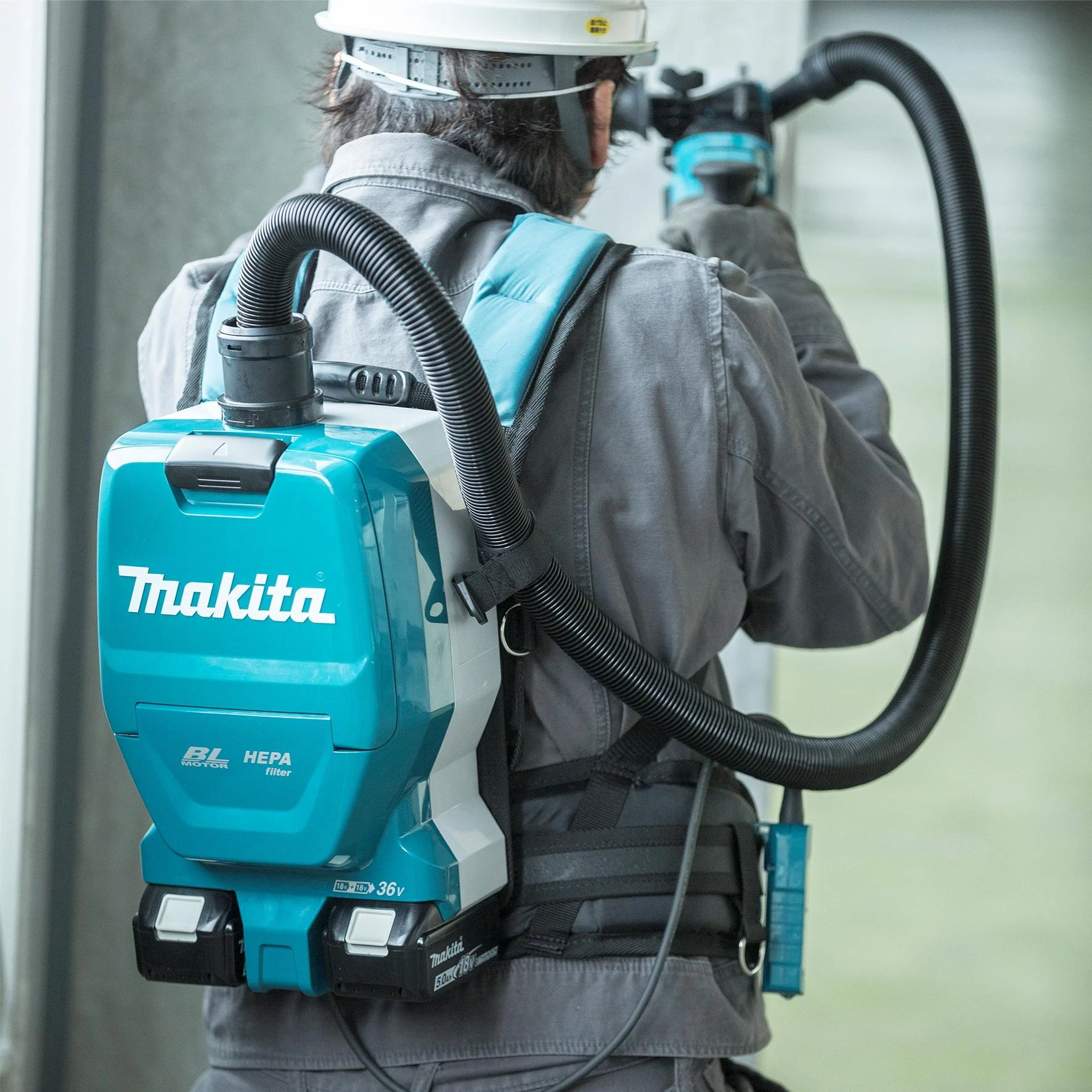 Makita DVC261ZX11 akumuliatorinis (kuprinė) dulkių siurblys (be kroviklio ir be akumuliatorių)