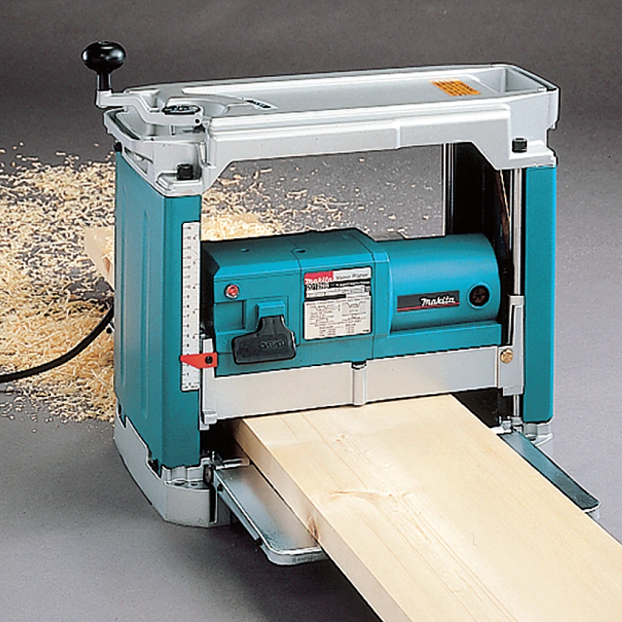 Makita 2012NBX Obliavimo staklės, 0-1,5/0-3,0mm, max 240x304mm, 8,5m/min, 1650 W su stovu
