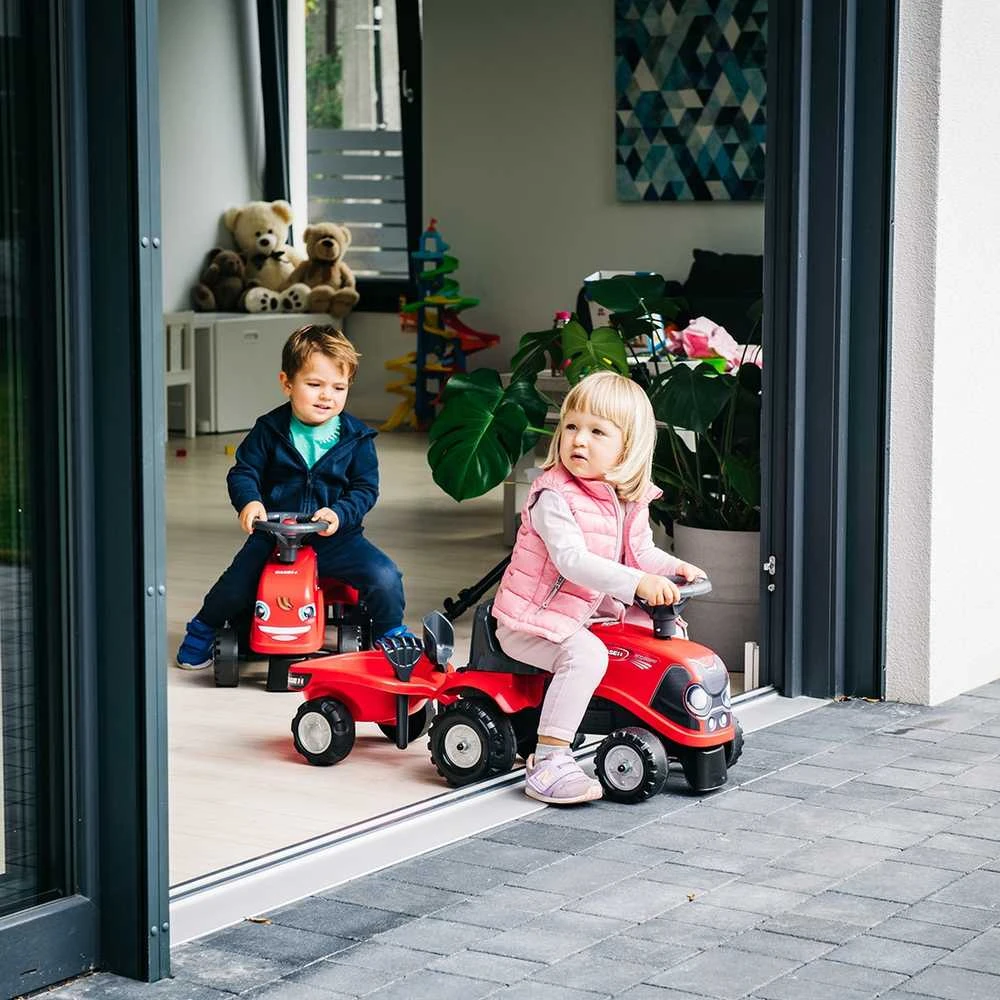 FALK Baby Case IH Ride-On Raudona with Trailer + Accessories for ages 12 months and up