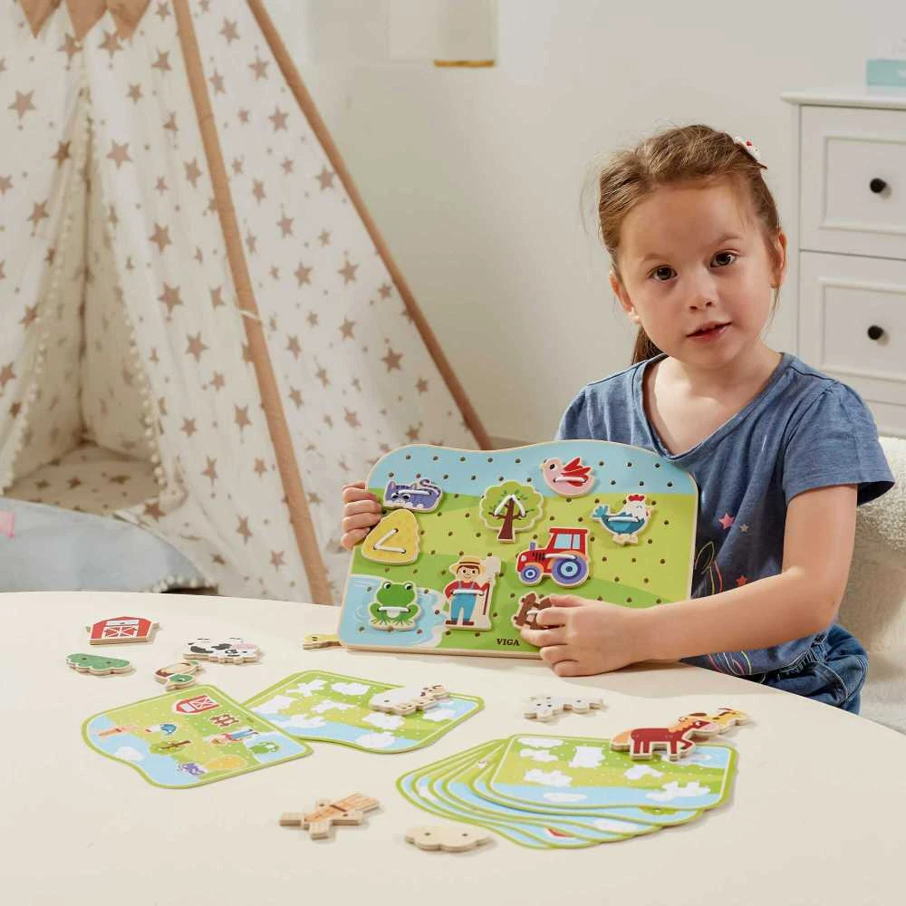 „Viga“ mediniai žibintų tarpininkai gyvūnai Montessori ūkyje