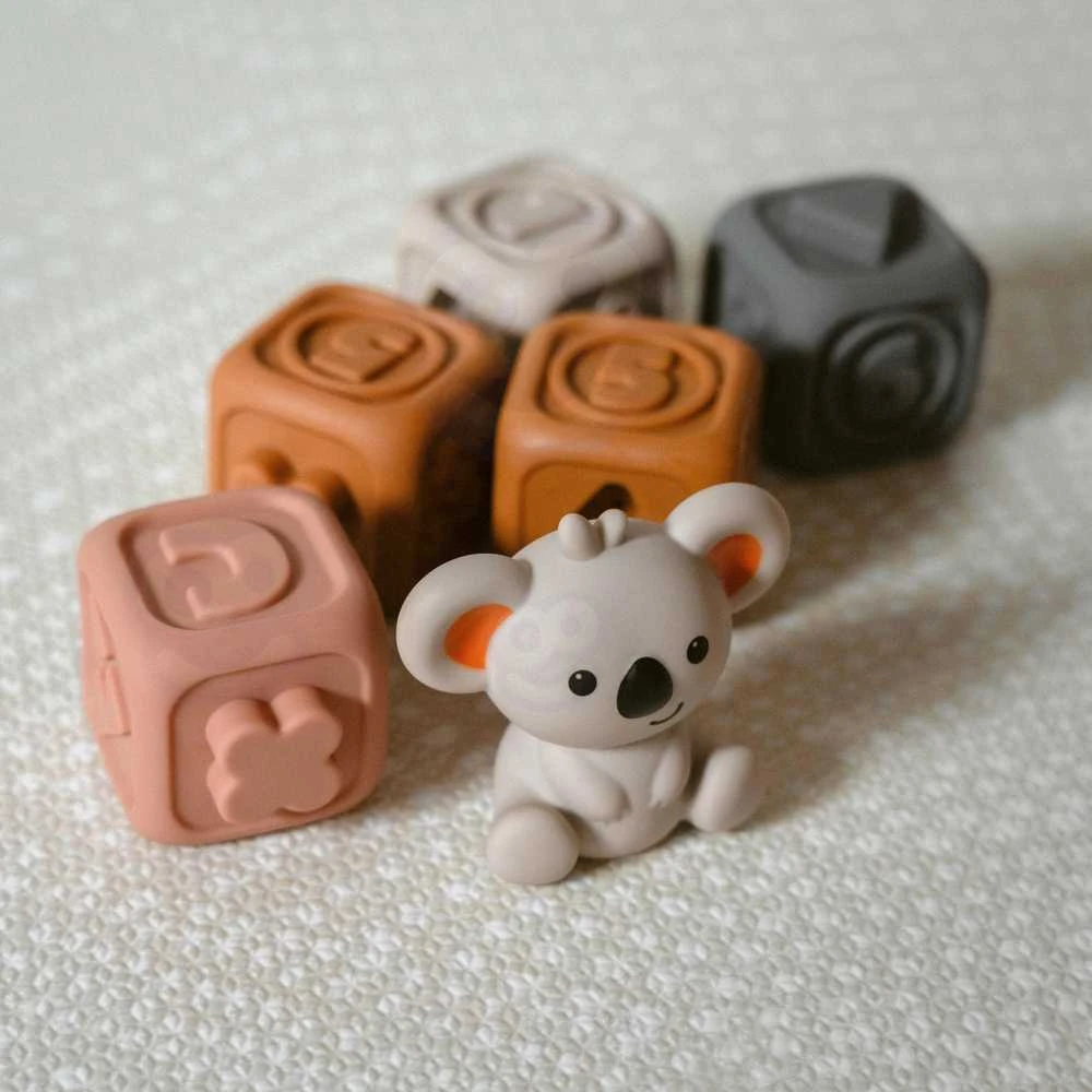 Woopie Baby Minkšta edukacinė 2in1 piramidė ir sensoriniai kaladėlės su skaičiais kūdikiams