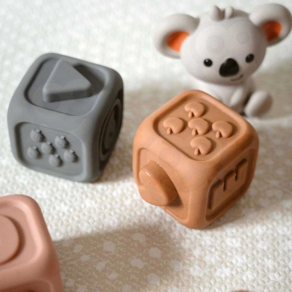 Woopie Baby Minkšta edukacinė 2in1 piramidė ir sensoriniai kaladėlės su skaičiais kūdikiams