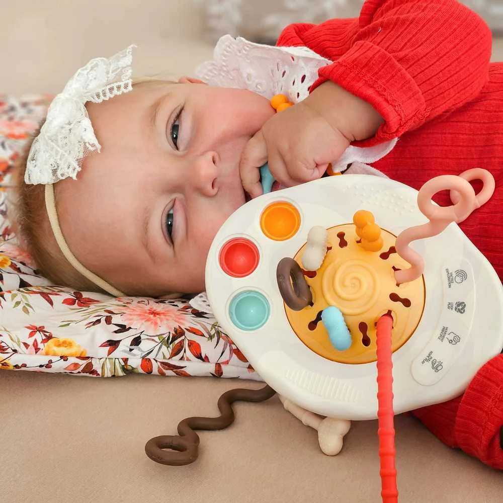 Woopie Baby UFO sensorinis barškutis su kramtuku