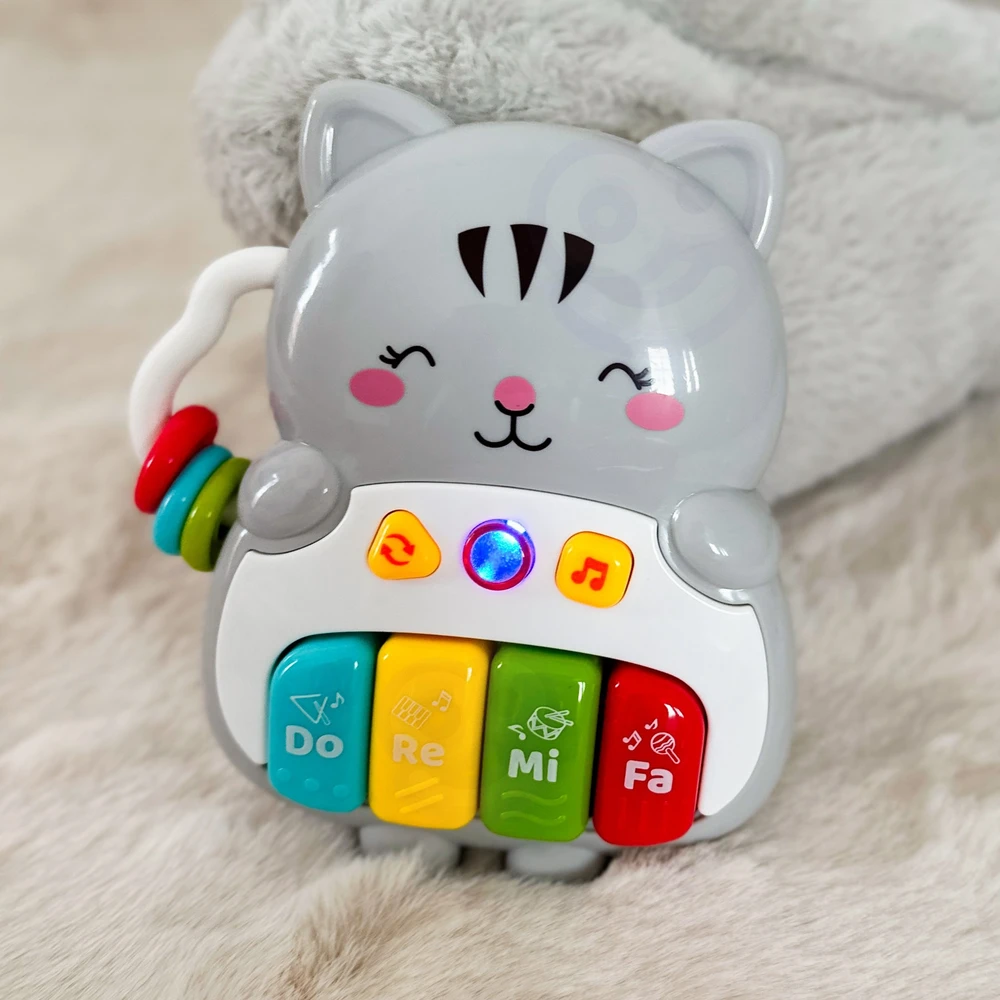 Woopie Baby WOOPIE interaktyvus pianino kačiukas muzikiniai vargonų garsai šviesa 18 mėn.+