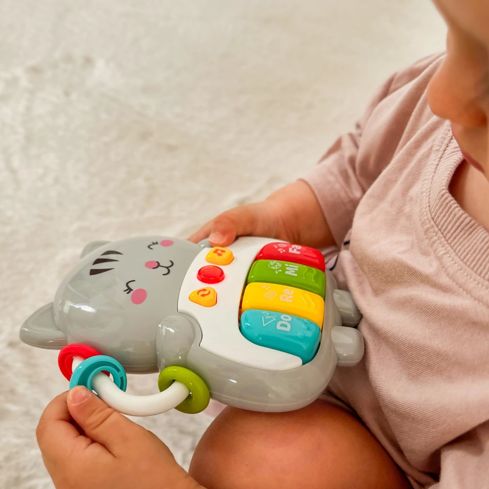 Woopie Baby WOOPIE interaktyvus pianino kačiukas muzikiniai vargonų garsai šviesa 18 mėn.+