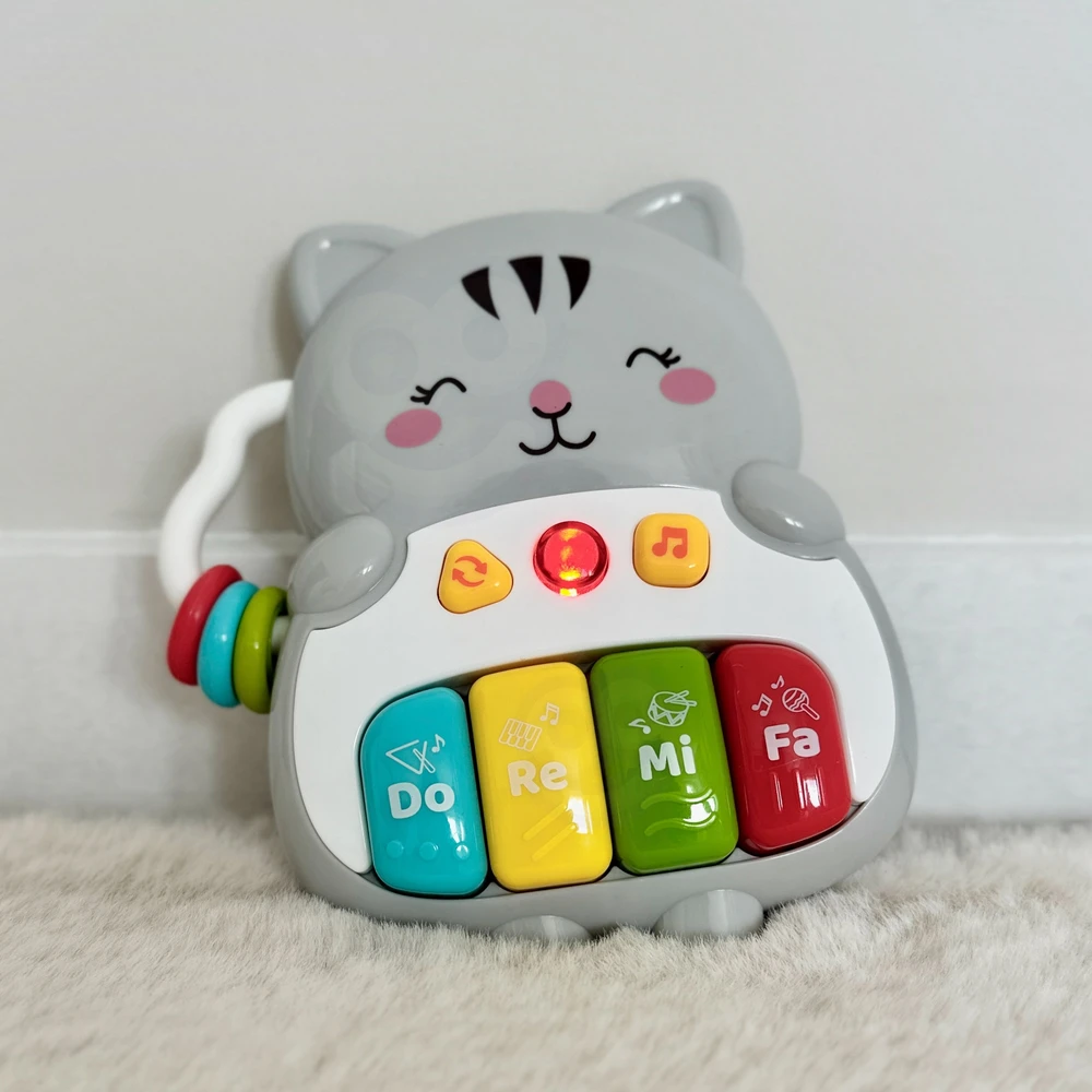 Woopie Baby WOOPIE interaktyvus pianino kačiukas muzikiniai vargonų garsai šviesa 18 mėn.+