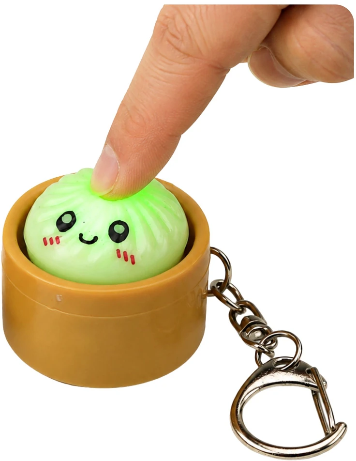 Lean Toys Raktų pakabukas su šviečiančiu koldūnu ir atverčiamu dangteliu, 3,5 × 3,5 cm