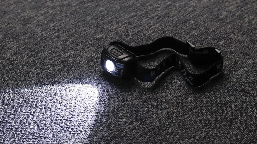 Montis Akumulatorowa latarka nagłowna su sensorem MT001 Juodas Headband prožektorius LED