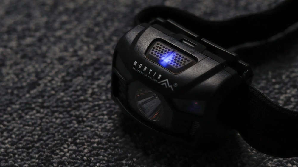 Montis Akumulatorowa latarka nagłowna su sensorem MT001 Juodas Headband prožektorius LED