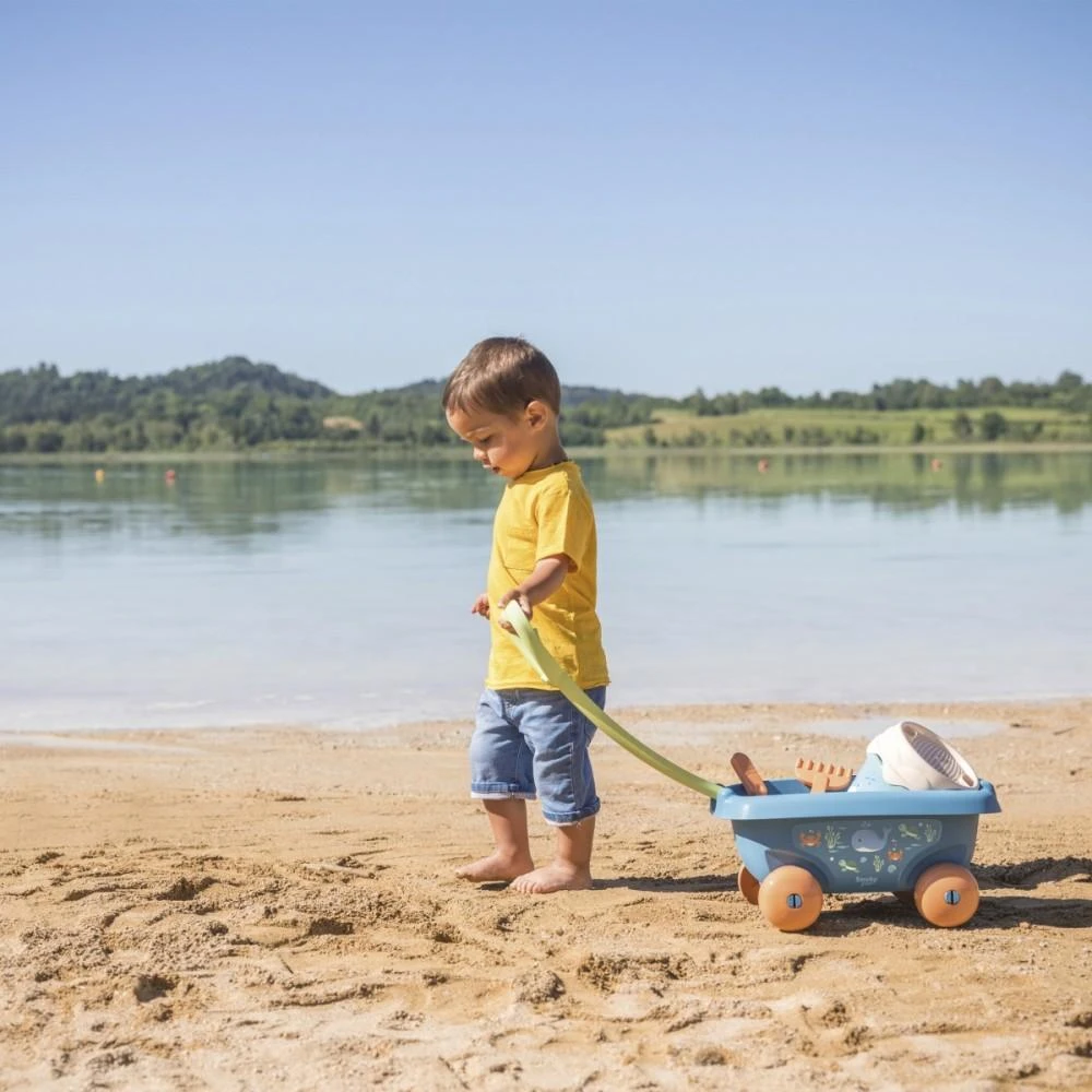„Smoby“ vežimėlis su kibire ir bioplastikų smėlio aksesuarais