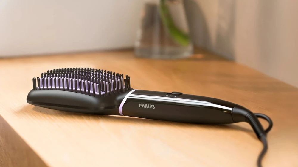 Philips „StyleCare Essential“ Šildomas tiesinimo šepetys BHH880/00