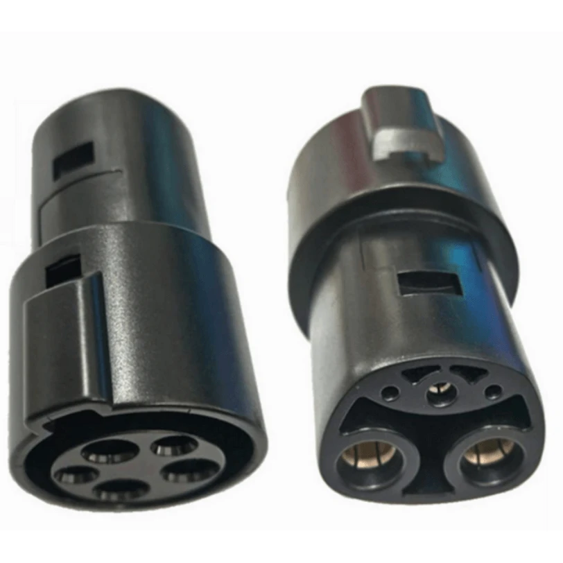 Tesla adapteris