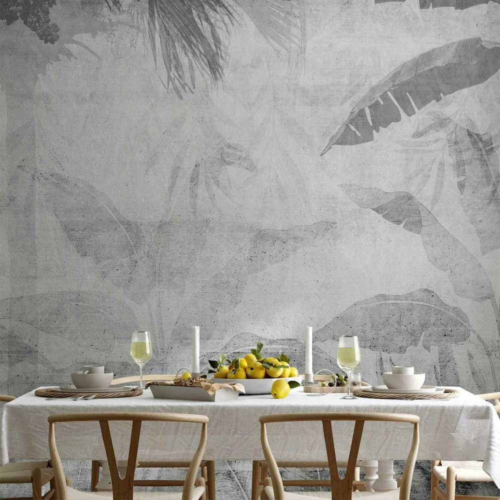 Artgeist Fototapetas - Vanishing jungle - landscape of exotic trees and leaves in pilkas tones
