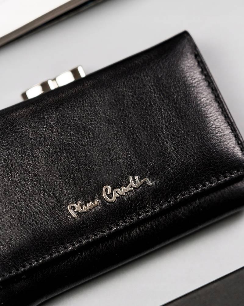 Pierre Cardin moteriška odinė rankinė, elegantiška, erdvi, užsegama spaude.