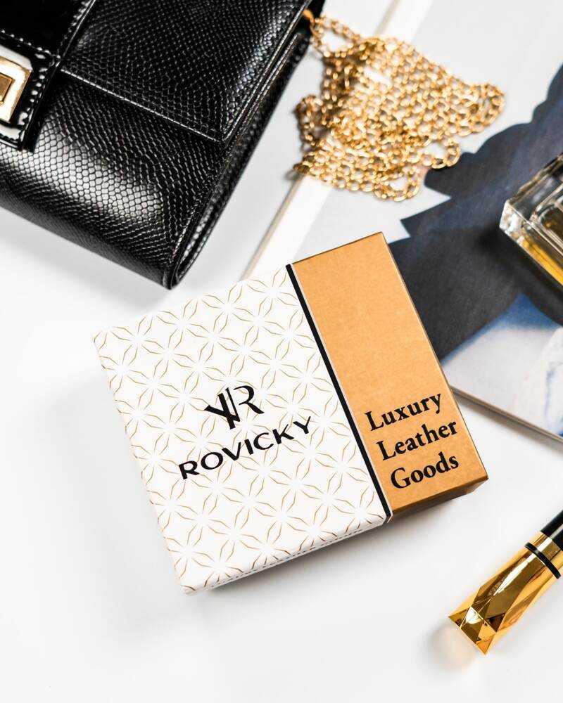 Elegantiška moteriška odinė piniginė su spaude - Rovicky
