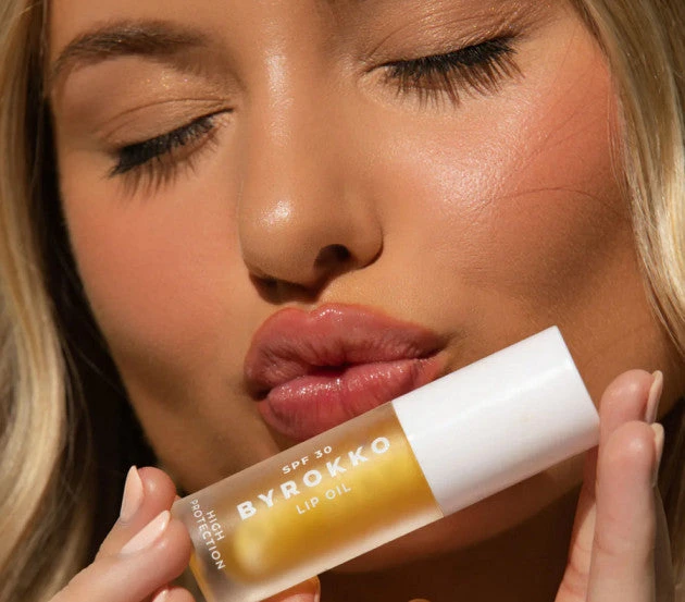 None Byrokko Shine Brown prabangus drėkinantis lūpų aliejus su SPF30