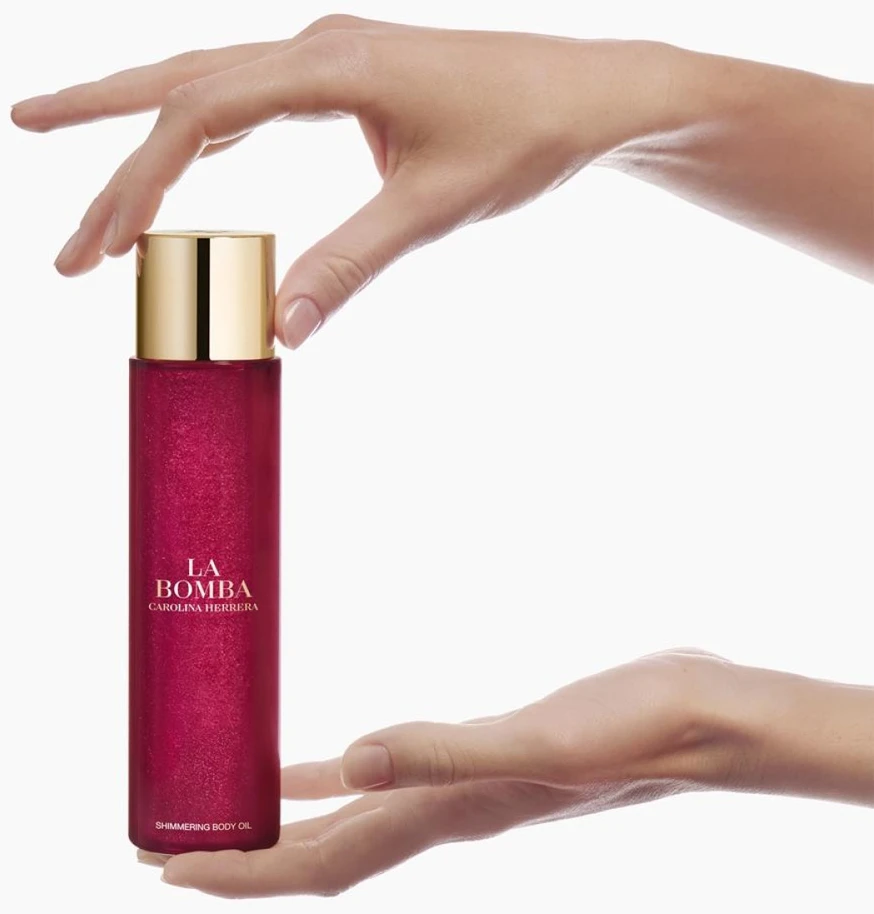 Žvilgesio suteikiantis kūno aliejus Carolina Herrera La Bomba Shimmering Body Oil, 150 ml