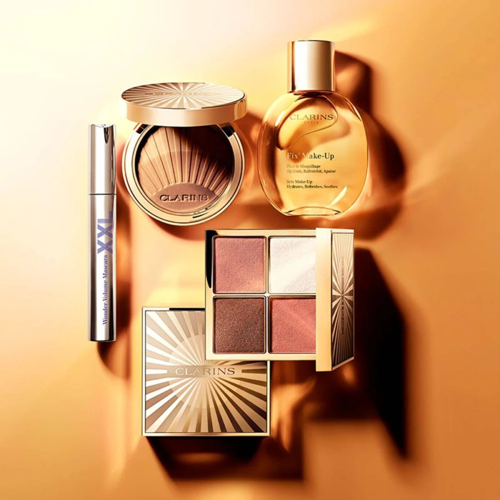 Clarins Fix' Make Up Golden Radiance Collection purškiamas makiažo fiksatorius, 50 ml