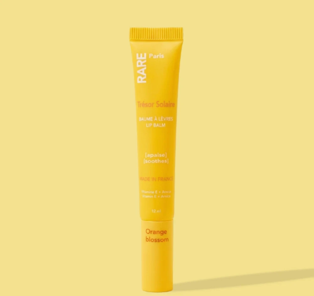 Rare Paris Trésor Solaire Soothing Lūpų balzamas Oranžinis Blossom Scent lūpų balzamas su vitaminu E ir arnikos ekstraktu, 12 ml