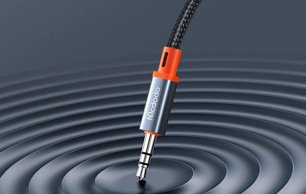 Mcdodo CA-0890 Lightning iki 3.5 mm AUX mini lizdo kabelis, 1.8 m (juodas) aprašymas - Prekės nuotrauka