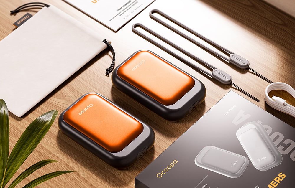 Ocoopa UT4 Young 2x2500 mAh rankų šildytuvas, USB-C, juoda ir oranžinė aprašymas - Prekės nuotrauka