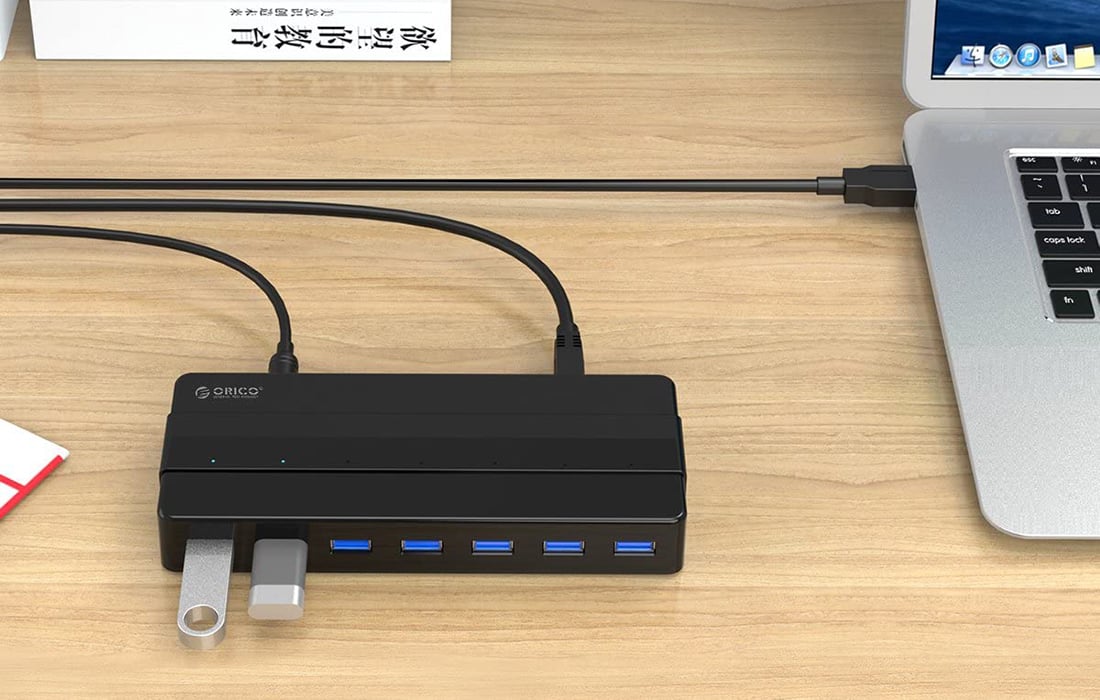 „Orico“ šakotuvas, 7xUSB, 30 colių, juodas
