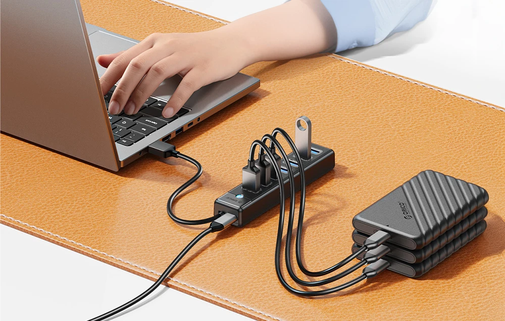 Orico Hub USB-A iki 7xUSB-A 3.0 – juoda aprašymas - Prekės nuotrauka Orico Hub USB-A iki 7xUSB-A 3.0 – juoda aprašymas - Prekės nuotrauka