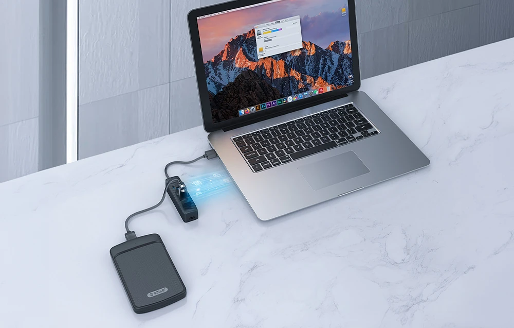 Orico Hub USB-A iki 4xUSB-A 3.0 – juoda aprašymas - Prekės nuotrauka Orico Hub USB-A iki 4xUSB-A 3.0 – juoda aprašymas - Prekės nuotrauka