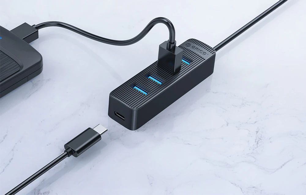 Orico Hub USB-A iki 4xUSB-A 3.0 – juoda aprašymas - Prekės nuotrauka Orico Hub USB-A iki 4xUSB-A 3.0 – juoda aprašymas - Prekės nuotrauka