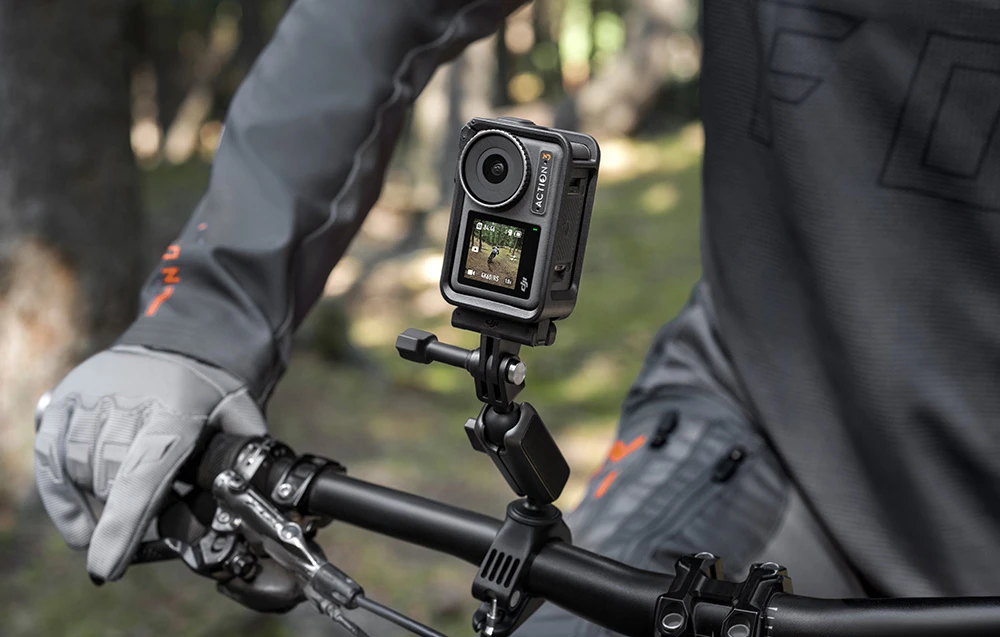 DJI Osmo Action vairo laikiklis aprašymas - Prekės nuotrauka DJI Osmo Action vairo laikiklis aprašymas - Prekės nuotrauka