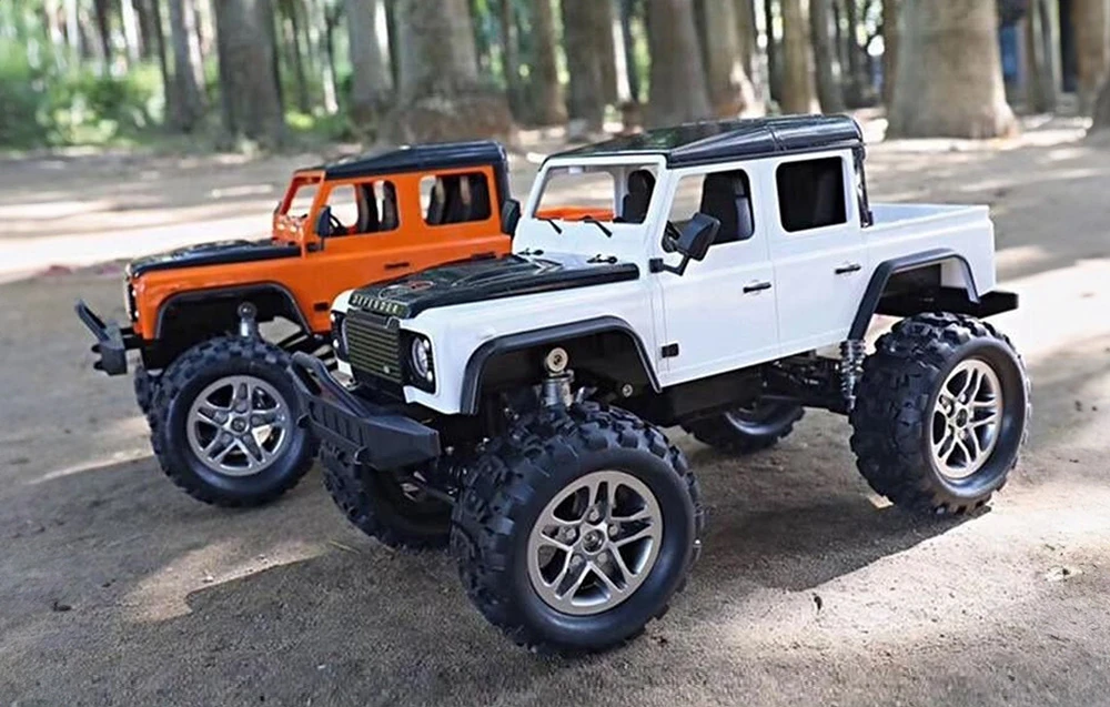 Nuotoliniu būdu valdomas automobilis 1:14 Double Eagle (organge) Land Rover Defender (pikas) E332-003 aprašymas - Prekės nuotrauka Nuotoliniu būdu valdomas automobilis 1:14 Double Eagle (organge) Land Rover Defender (pikas) E332-003 aprašymas - Prekės nuotrauka