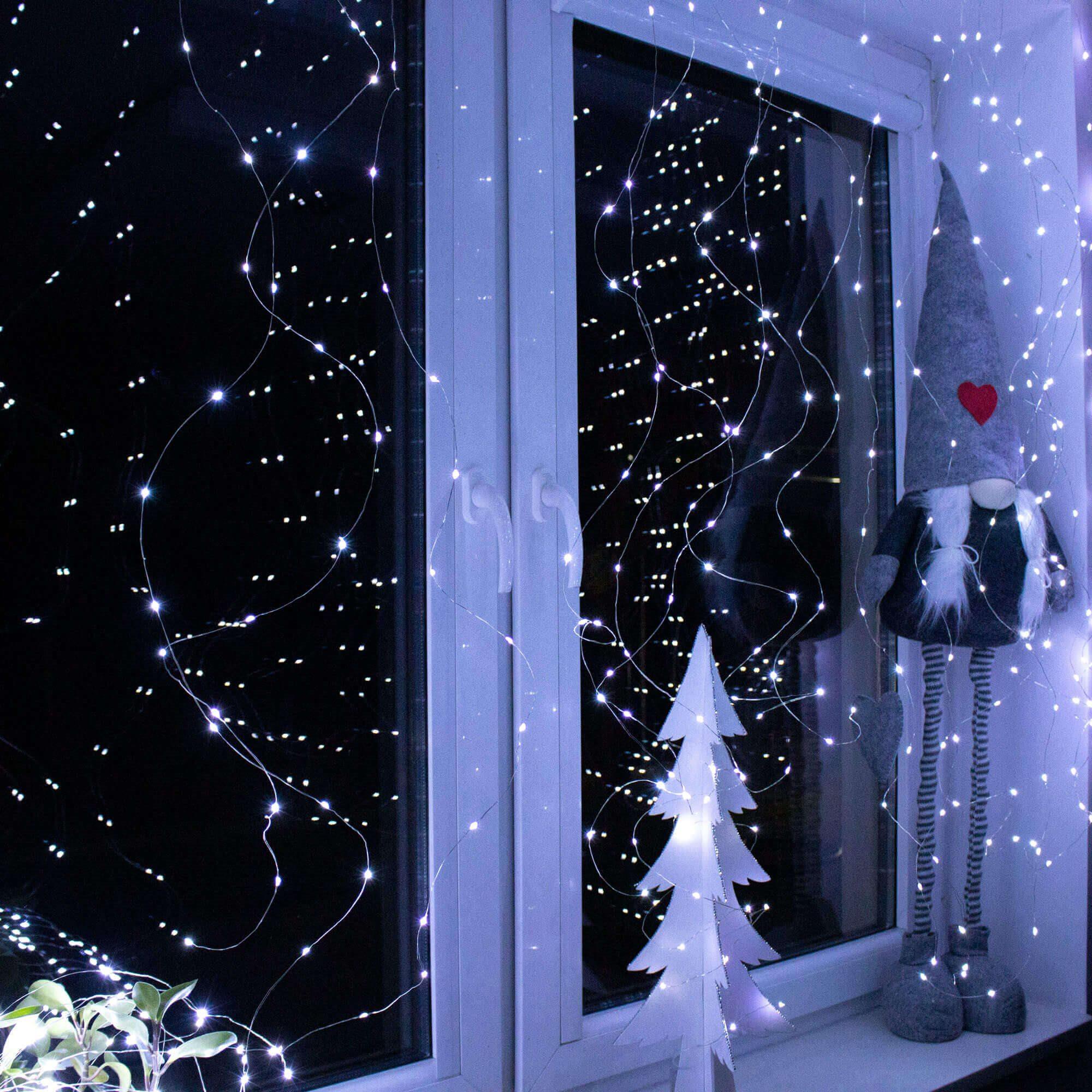 Kalėdinės užuolaidinės lemputės Springos 300 LED, 3x3 m, šaltai balta