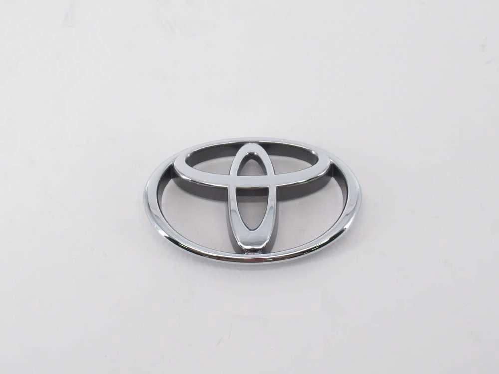 AUTENTIŠKAS TOYOTA 4RUNNER TACOMA T100 PICKUP PRIEKINIS GROTELIŲ CHROMO EMBLEMA 75311-35090