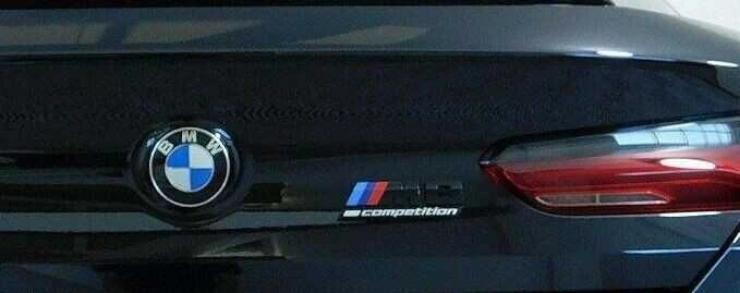 BMW 8' F91 F92 M8 Competition Galinis juodas ženkliukas bagažinės emblema 51148098328 Originali