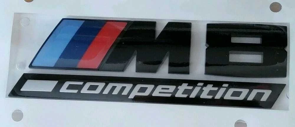 BMW 8' F91 F92 M8 Competition Galinis juodas ženkliukas bagažinės emblema 51148098328 Originali