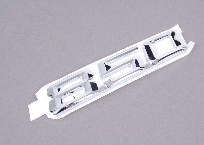 BMW E31 emblema, priklijuota prie galinės dalies, originali 51148152850