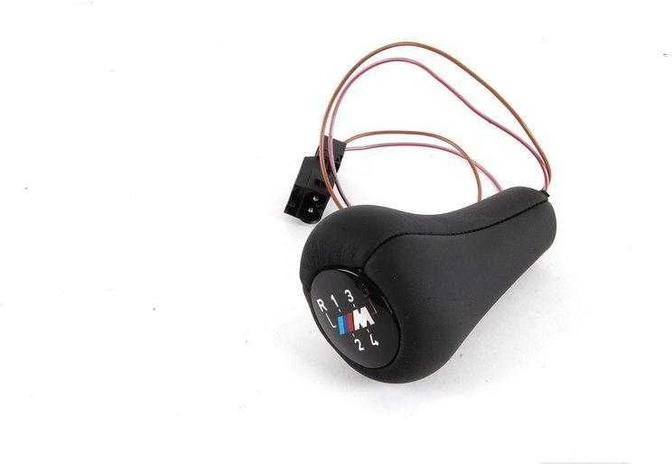 BMW E34 E36 greičio emblema perjungimo rankenėlės rankena 25112231550 Originali