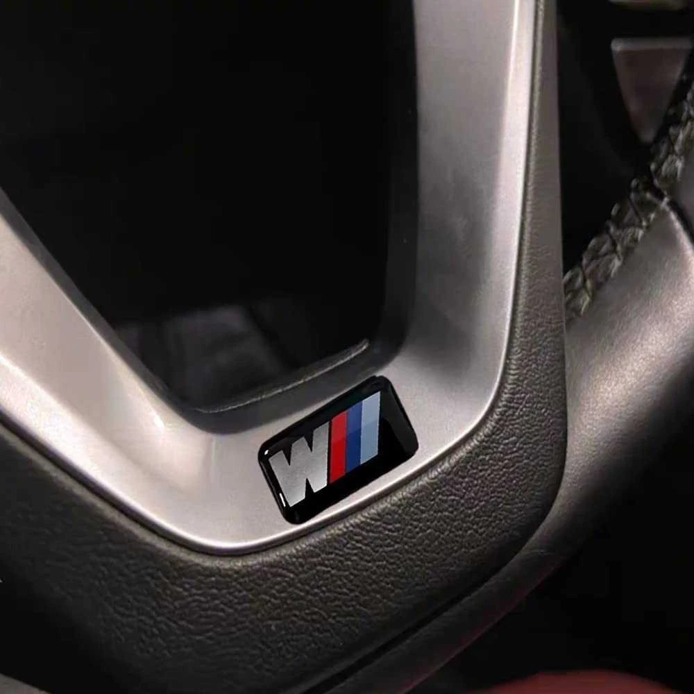 BMW E38 F01 F02 G11 X5 E70 Ratų emblema su ženkliuku originali 36112228660