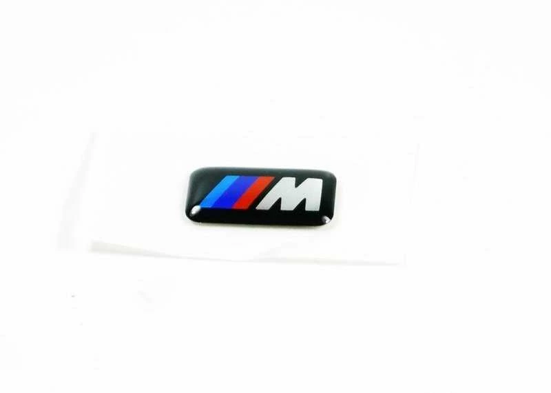 BMW E38 F01 F02 G11 X5 E70 Ratų emblema su ženkliuku originali 36112228660