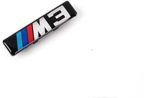 BMW E46 priekinio sparno apdailos grotelių emblema Originali 72127900605