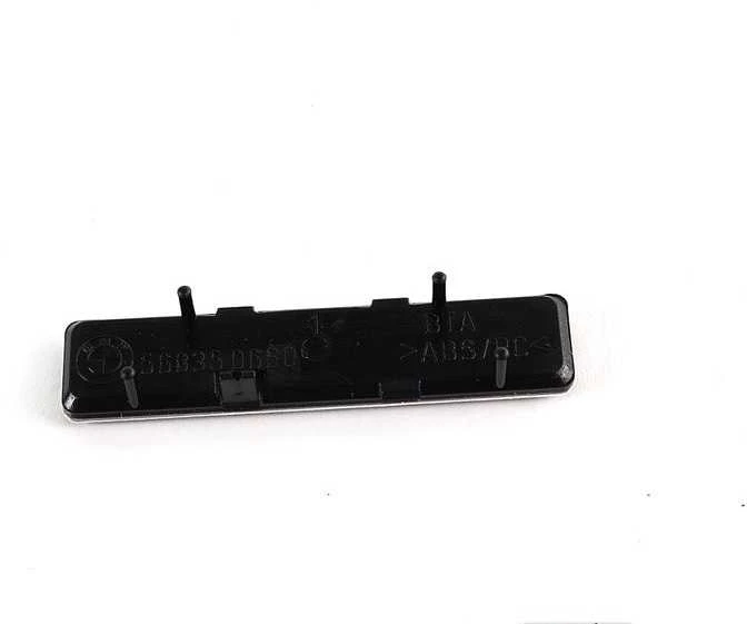 BMW E46 priekinio sparno apdailos grotelių emblema Originali 72127900605