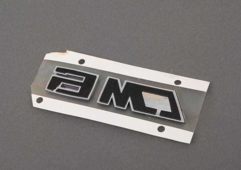BMW E63 E64 emblema priklijuota originali 51147898225