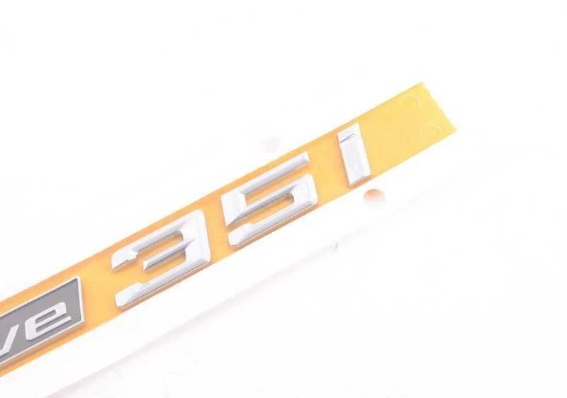 BMW F15 F16 X5 X6 xDrive35i priekinių kairiųjų arba dešiniųjų durų emblema 51147345059 originali